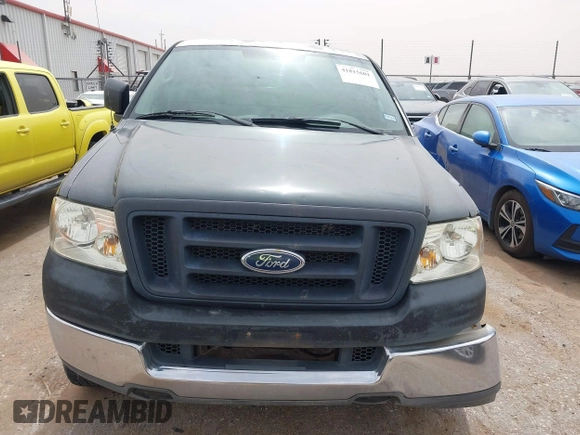 2005 Ford F-150 XL with VIN 1FTRF14555KB88186, listed as a IAAI auction lot 41815601 with 195,049 mi miles. Bid and sale history available at carsss.com. Image 12.