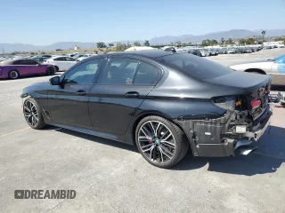 2021 BMW 5 Series 540i with VIN WBA53BJ05MWW92487, listed as a Copart auction lot 57679975 with 53,311 mi miles and Salvage title. Bid and sale history available at DreamBid. Image 2.