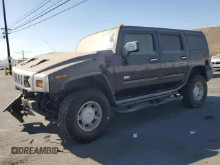 2004 Hummer H2 with VIN 5GRGN23U24H104327, listed as a Copart auction lot 74150914 with 181,933 mi miles and Salvage Title. Bid and sale history available at carsss.com. Image 1.
