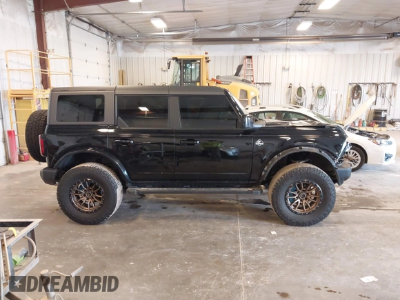 2022 Ford Bronco with VIN 1FMDE5DH0NLB06451, listed as a IAAI auction lot 42060509 with 55,624 mi miles and . Bid and sale history available at DreamBid. Image 13.