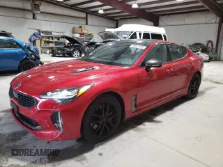 2018 Kia Stinger GT2 with VIN KNAE55LC1J6019968, listed as a Copart auction lot 52074985 with 122,046 mi miles and Salvage Title. Bid and sale history available at carsss.com. Image 1.