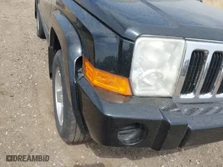 2007 Jeep Commander Sport with VIN 1J8HG48K17C651084, listed as a IAAI auction lot 42064395 with 212,057 mi miles. Bid and sale history available at carsss.com. Image 6.