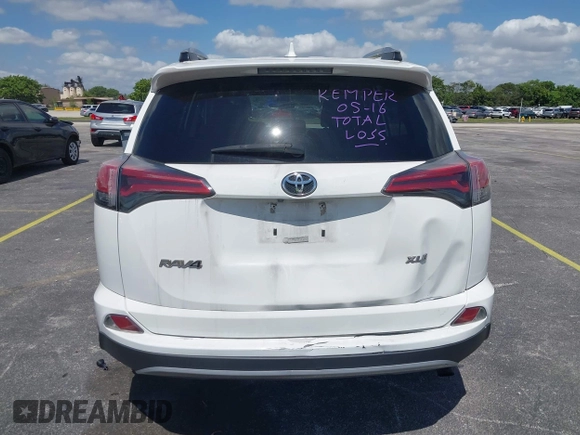 2018 Toyota RAV4 XLE with VIN 2T3WFREV9JW490324, listed as a IAAI auction lot 42298261 with 167,727 mi miles and . Bid and sale history available at DreamBid. Image 16.