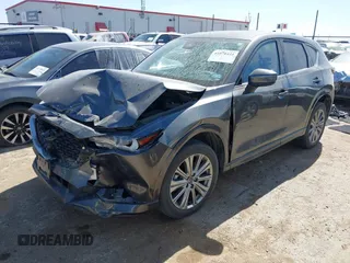2023 Mazda CX-5 Signature with VIN JM3KFBXY8P0101156, listed as a IAAI auction lot 41670424 with Not Provided miles and . Bid and sale history available at carsss.com. Image 16.