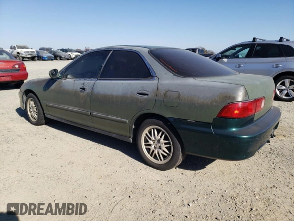 1999 Acura Integra LS with VIN JH4DB7657XS001635, listed as a Copart auction lot 42742925 with 157,447 mi miles and Clean title. Bid and sale history available at DreamBid. Image 2.