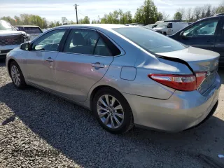 2015 Toyota Camry LE with VIN 4T1BD1FKXFU156118, listed as a Copart auction lot 52772745 with 129,600 mi miles and Salvage Title. Bid and sale history available at DreamBid. Image 2.