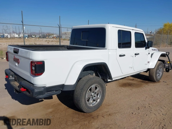 2020 Jeep Gladiator Rubicon with VIN 1C6JJTBG6LL187235, listed as a IAAI auction lot 42010374 with Not Provided miles and . Bid and sale history available at DreamBid. Image 4.