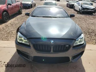 2016 BMW M6 z VIN WBS6J9C51GD934487, wystawiony jako Copart lot #45756775 z przebiegiem 62 179 mil mil oraz Szkoda całkowita • Salvage title. Historia ofert i sprzedaży dostępna na DreamBid. Obrazek 5.