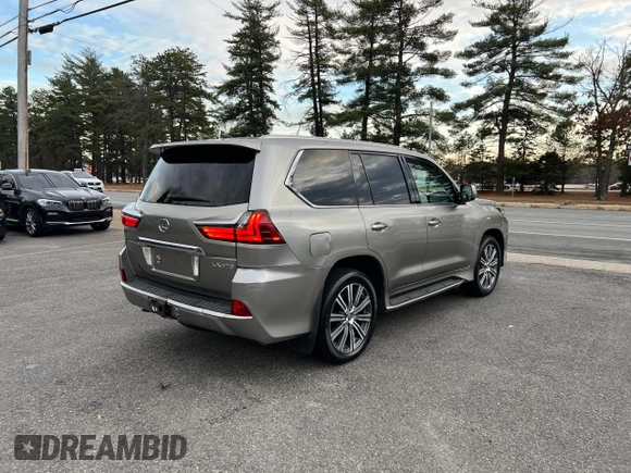 2016 Lexus LX 570 with VIN JTJHY7AX7G4203810, listed as a Copart auction lot 86017494 with 296,703 mi miles and Clean Title. Bid and sale history available at DreamBid. Image 4.