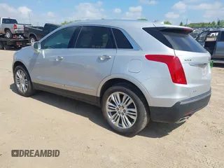 2017 Cadillac XT5 Premium Luxury AWD z VIN 1GYKNERS6HZ112170, wystawiony jako IAAI lot #42262116 z przebiegiem 140 982 mil mil oraz . Historia ofert i sprzedaży dostępna na DreamBid. Obrazek 3.