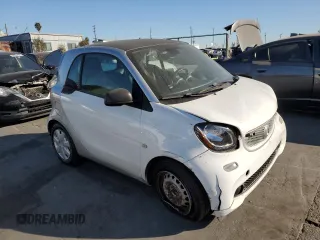 2016 Smart fortwo Passion z VIN WMEFJ5DAXGK125319, wystawiony jako Copart lot #87961455 z przebiegiem 37 246 mil mil oraz Szkody całkowita. Historia ofert i sprzedaży dostępna na DreamBid. Obrazek 4.