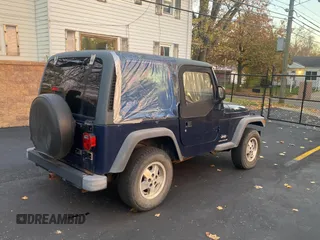 2003 Jeep Wrangler SE with VIN 1J4FA29143P371506, listed as a Copart auction lot 80153184 with 101,513 mi miles and Clean title. Bid and sale history available at DreamBid. Image 4.