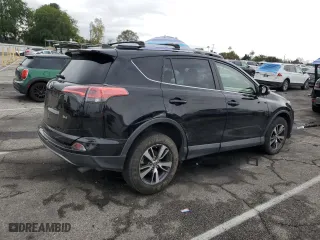 2018 Toyota RAV4 XLE with VIN 2T3WFREV8JW451241, listed as a Copart auction lot 48795135 with 92,208 mi miles and Salvage Title. Bid and sale history available at carsss.com. Image 3.