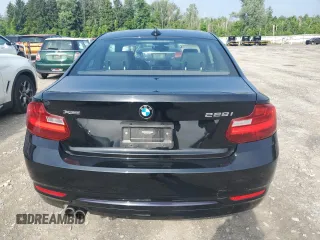 2016 BMW 2 Series 228i xDrive with VIN WBA1G9C52GV598419, listed as a Copart auction lot 62464515 with 49,793 mi miles and Salvage title. Bid and sale history available at DreamBid. Image 6.