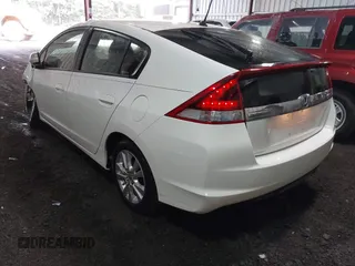 2012 Honda Insight EX with VIN JHMZE2H71CS003132, listed as a IAAI auction lot 42582548 with 112,593 mi miles and . Bid and sale history available at DreamBid. Image 3.