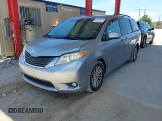 2011 Toyota Sienna XLE AAS with VIN 5TDYK3DC1BS007820, listed as a IAAI auction lot 41935200 with 123,554 mi miles. Bid and sale history available at carsss.com. Image 17.