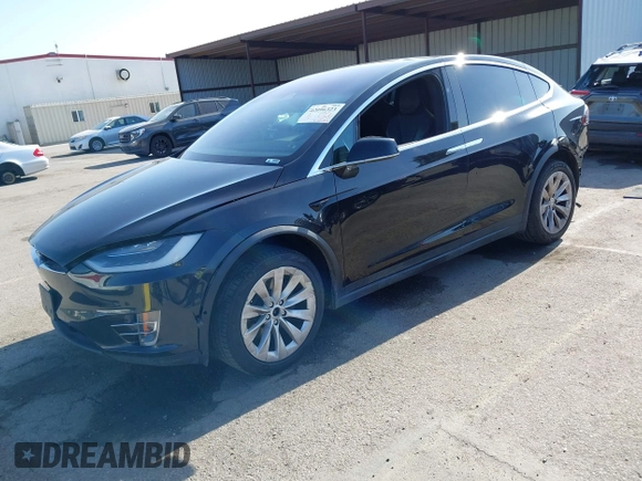 2017 Tesla Model X 90D with VIN 5YJXCBE25HF044617, listed as a IAAI auction lot 42096323 with 115,077 mi miles and . Bid and sale history available at DreamBid. Image 2.