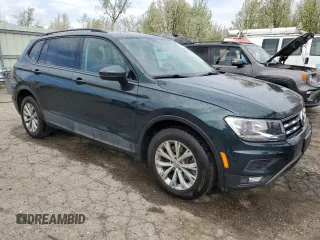 2018 Volkswagen Tiguan S with VIN 3VV0B7AX2JM017137, listed as a Copart auction lot 54618705 with 69,026 mi miles and Clean Title. Bid and sale history available at DreamBid. Image 4.