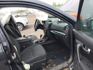 2013 Kia Sorento LX with VIN 5XYKTCA67DG405003, listed as a IAAI auction lot 42253887 with 197,093 mi miles and . Bid and sale history available at DreamBid. Image 5.