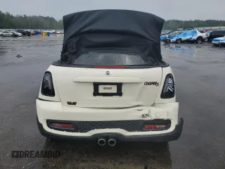 2014 MINI Convertible S с VIN WMWZP3C5XET706231, выставлен на аукционе Copart как лот 55610615 с пробегом 70 416 миль миль и Списание • Salvage title. История ставок и продаж доступна на DreamBid. Изображение 6.