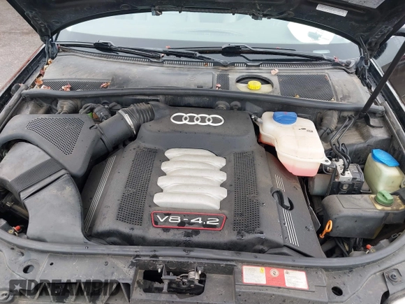 2002 Audi S6 z VIN WAUXU54B62N070925, wystawiony jako IAAI lot #38122381 z przebiegiem 219 441 mil mil oraz . Historia ofert i sprzedaży dostępna na DreamBid. Obrazek 10.