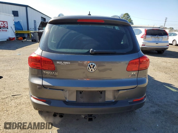 2016 Volkswagen Tiguan S with VIN WVGBV7AX0GW524346, listed as a Copart auction lot 87221564 with 163,609 mi miles and Salvage Title. Bid and sale history available at DreamBid. Image 6.