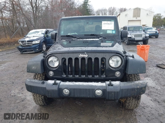 2017 Jeep Wrangler Sport z VIN 1C4GJWAG1HL502374, wystawiony jako IAAI lot #41938257 z przebiegiem 95 469 mil mil oraz . Historia ofert i sprzedaży dostępna na DreamBid. Obrazek 12.