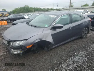 2016 Honda Civic EX-L with VIN 19XFC1F71GE210815, listed as a Copart auction lot 55735675 with 142,820 mi miles and Salvage title. Bid and sale history available at DreamBid. Image 1.