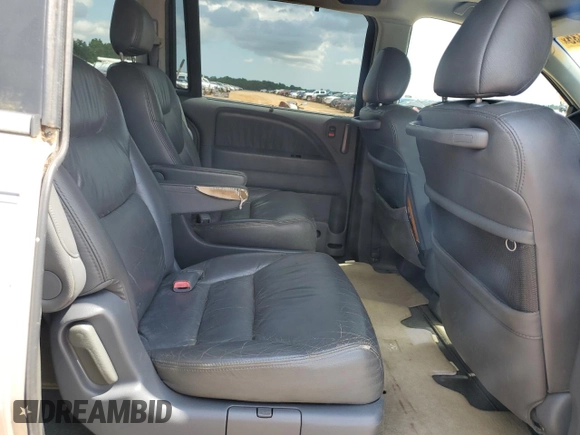 2006 Honda Odyssey EX-L z VIN 5FNRL387X6B458818, wystawiony jako Copart lot #61801335 z przebiegiem 227 179 mil mil oraz Czysty tytuł • Clean title. Historia ofert i sprzedaży dostępna na DreamBid. Obrazek 11.