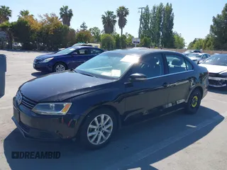 2014 Volkswagen Jetta SE with VIN 3VWD17AJ9EM372677, listed as a IAAI auction lot 42406449 with 266,331 mi miles and . Bid and sale history available at DreamBid. Image 6.