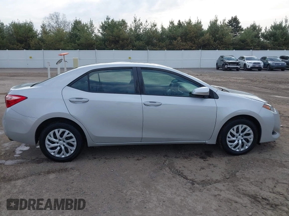 2019 Toyota Corolla L with VIN 5YFBURHE2KP934042, listed as a IAAI auction lot 41963491 with 87,299 mi miles. Bid and sale history available at carsss.com. Image 14.