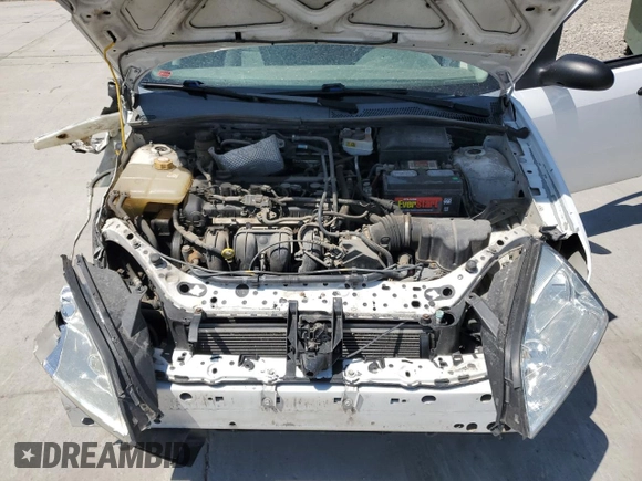 2005 Ford Focus S with VIN 1FAFP34N05W296550, listed as a Copart auction lot 59391835 with 216,509 mi miles and Salvage title. Bid and sale history available at DreamBid. Image 11.