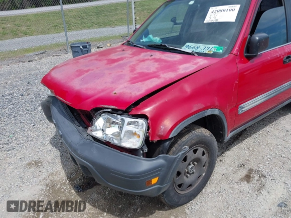 2000 Honda CR-V LX with VIN JHLRD184XYC010847, listed as a IAAI auction lot 42080100 with 256,678 mi miles and . Bid and sale history available at DreamBid. Image 17.