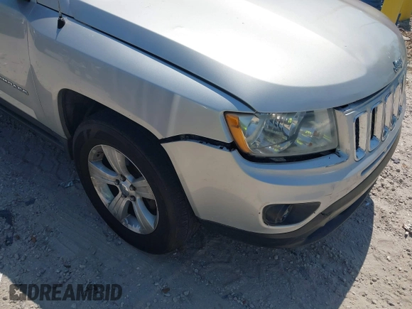 2012 Jeep Compass Sport with VIN 1C4NJCBA7CD660091, listed as a IAAI auction lot 42113038 with 123,181 mi miles. Bid and sale history available at carsss.com. Image 6.