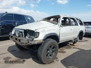1998 Toyota 4Runner SR5 z VIN JT3HN86R2W0172312, wystawiony jako IAAI lot #42214433 z przebiegiem 259 170 mil mil oraz . Historia ofert i sprzedaży dostępna na DreamBid. Obrazek 2.