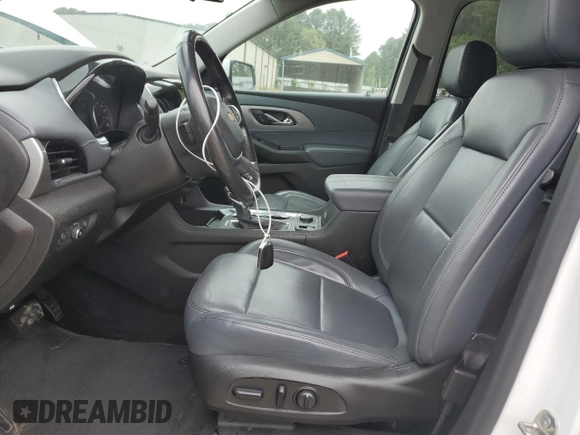 2021 Chevrolet Traverse LT with VIN 1GNEVHKWXMJ214024, listed as a Copart auction lot 56917015 with 68,829 mi miles and Salvage title. Bid and sale history available at DreamBid. Image 7.