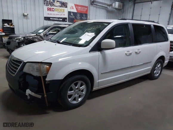 2010 Chrysler Town & Country Touring with VIN 2A4RR5D15AR450922, listed as a IAAI auction lot 41706412 with 93,894 mi miles. Bid and sale history available at carsss.com. Image 17.