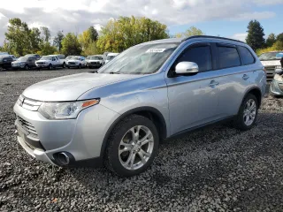2015 Mitsubishi Outlander SE with VIN JA4AZ3A34FZ007553, listed as a Copart auction lot 76631834 with 166,645 mi miles and Salvage title. Bid and sale history available at DreamBid. Image 1.