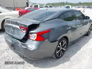 2018 Nissan Maxima SL with VIN 1N4AA6AP6JC385831, listed as a IAAI auction lot 41947837 with 108,714 mi miles and . Bid and sale history available at DreamBid. Image 4.