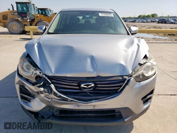 2016 Mazda CX-5 Sport with VIN JM3KE2BY6G0671358, listed as a Copart auction lot 51990095 with 117,763 mi miles and Salvage Title. Bid and sale history available at carsss.com. Image 5.