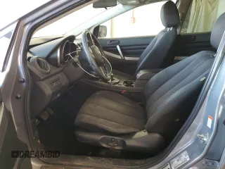 2011 Mazda CX-7 i Sport z VIN JM3ER2B52B0375902, wystawiony jako Copart lot #53472215 z przebiegiem 182 634 mil mil oraz Szkody całkowita. Historia ofert i sprzedaży dostępna na DreamBid. Obrazek 7.