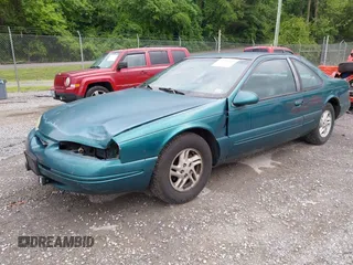 1996 Ford Thunderbird LX z VIN 1FALP62W9TH118637, wystawiony jako IAAI lot #42311641 z przebiegiem 96 361 mil mil oraz . Historia ofert i sprzedaży dostępna na DreamBid. Obrazek 2.