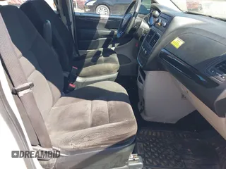2016 Dodge Grand Caravan SE with VIN 2C4RDGBG9GR401187, listed as a IAAI auction lot 42133432 with 107,742 mi miles and . Bid and sale history available at DreamBid. Image 5.