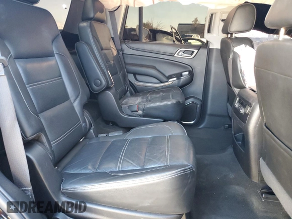 2018 GMC Yukon Denali with VIN 1GKS1CKJ0JR106589, listed as a Copart auction lot 79977034 with 98,022 mi miles and Salvage Title. Bid and sale history available at carsss.com. Image 11.