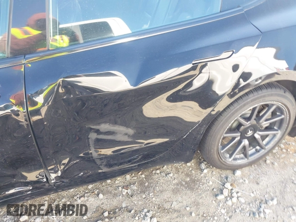 2018 Tesla Model 3 Long Range Battery z VIN 5YJ3E1EA9JF123109, wystawiony jako IAAI lot #42038158 z przebiegiem 133 361 mil mil oraz . Historia ofert i sprzedaży dostępna na DreamBid. Obrazek 20.