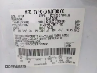 2014 Ford F-150 XL with VIN 1FTFX1CFXEFC62401, listed as a IAAI auction lot 41525607 with 138,459 mi miles. Bid and sale history available at carsss.com. Image 9.