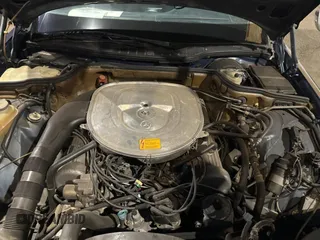 1984 Mercedes-Benz 500 z VIN WDBCA37A9EA027109, wystawiony jako Copart lot #74401344 z przebiegiem 137 953 mil mil oraz Tytuł czysty. Historia ofert i sprzedaży dostępna na DreamBid. Obrazek 7.