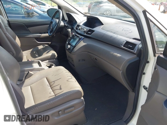 2014 Honda Odyssey EX-L with VIN 5FNRL5H69EB048867, listed as a IAAI auction lot 42190464 with 172,487 mi miles and . Bid and sale history available at carsss.com. Image 5.