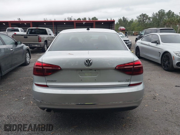2019 Volkswagen Passat 2.0T Wolfsburg Edition with VIN 1VWLA7A3XKC007385, listed as a IAAI auction lot 41409014 with 36,208 mi miles. Bid and sale history available at carsss.com. Image 16.