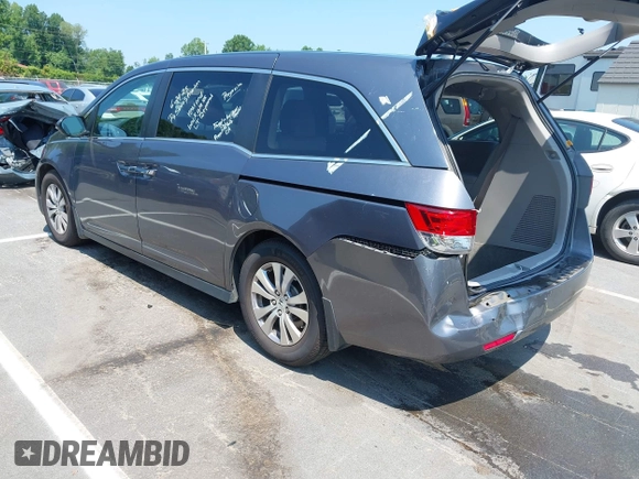 2014 Honda Odyssey EX-L with VIN 5FNRL5H63EB073585, listed as a IAAI auction lot 42673004 with 119,971 mi miles and . Bid and sale history available at DreamBid. Image 3.